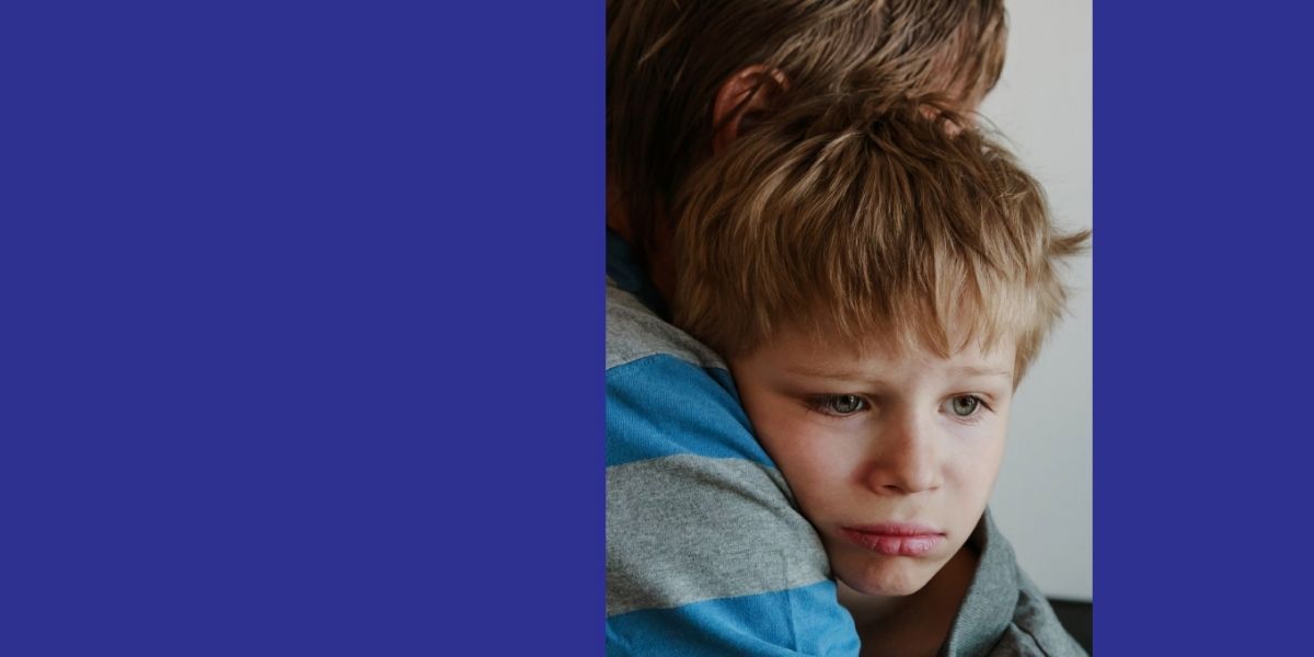 A child and parent embracing