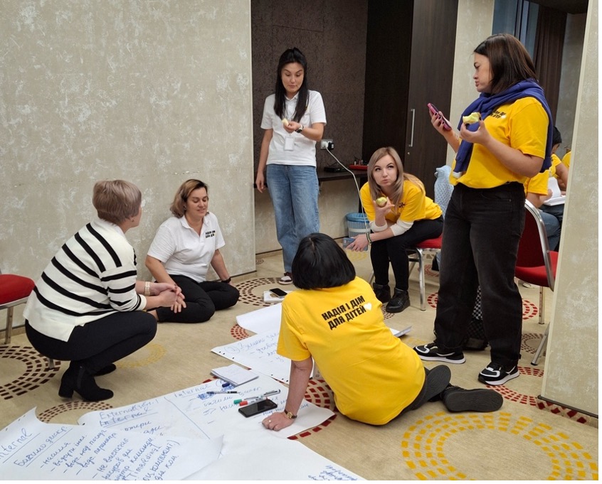 Staff members planning how to help children in Ukraine
