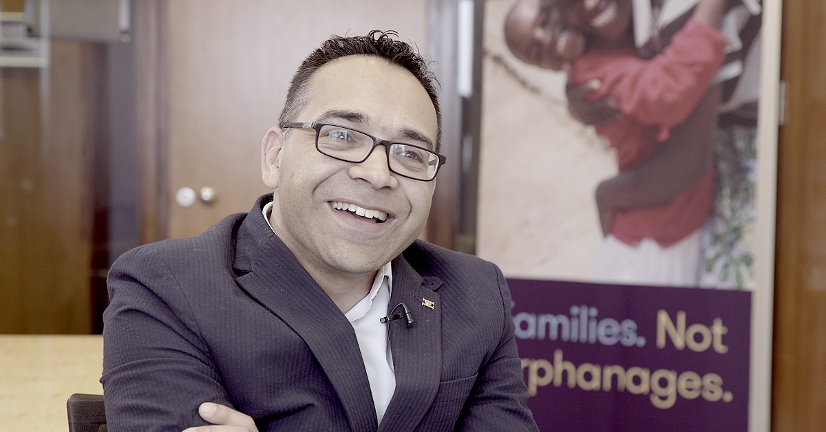 Krish Kandiah smiles as he chats to Steve Coffey