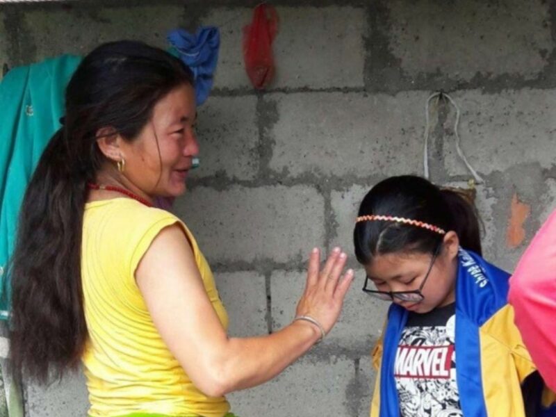 Maya and her mother in Nepal