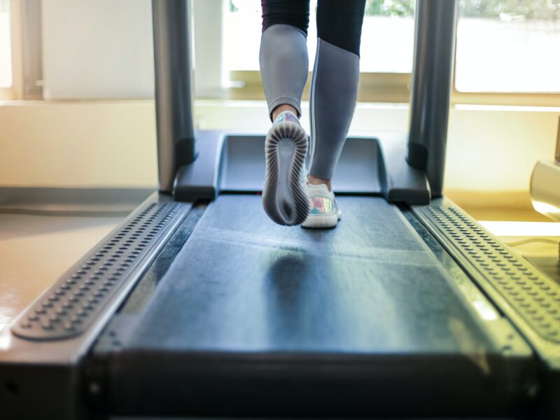 Feet running on a treadmill