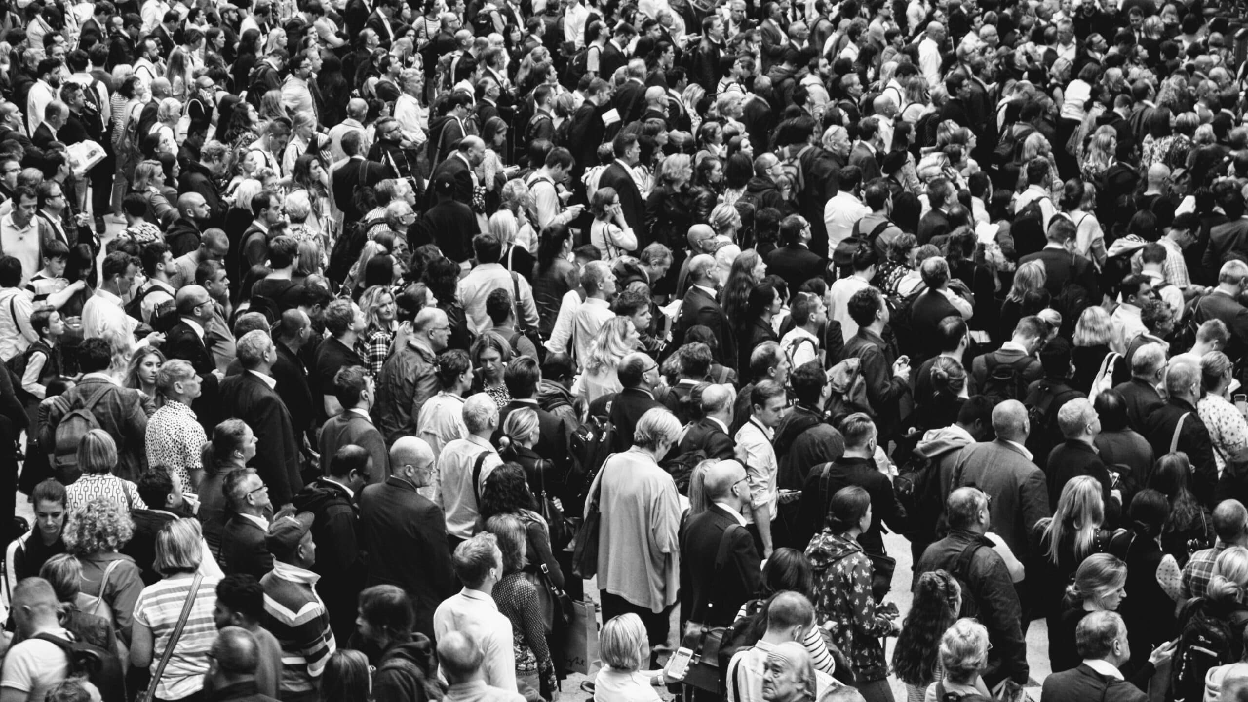 A photo featuring a sea of people, highlighting the extensive reach of our global population for World Population Day.