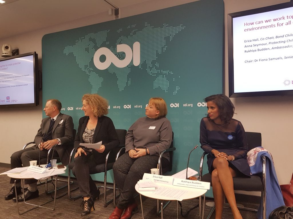 Speakers sitting at the Bond conference in London