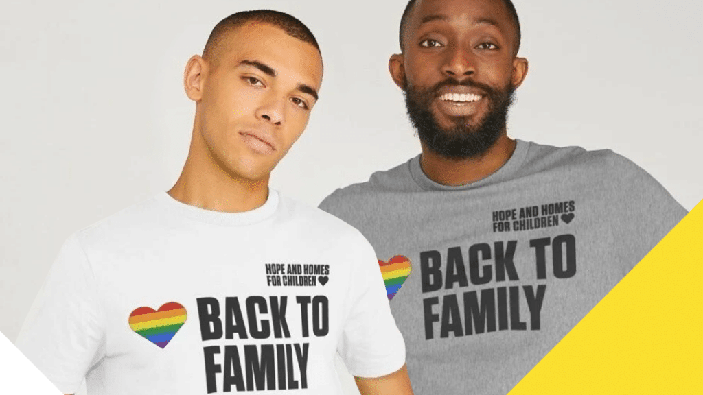 Two men in Back To Family Pride Month T-shirts
